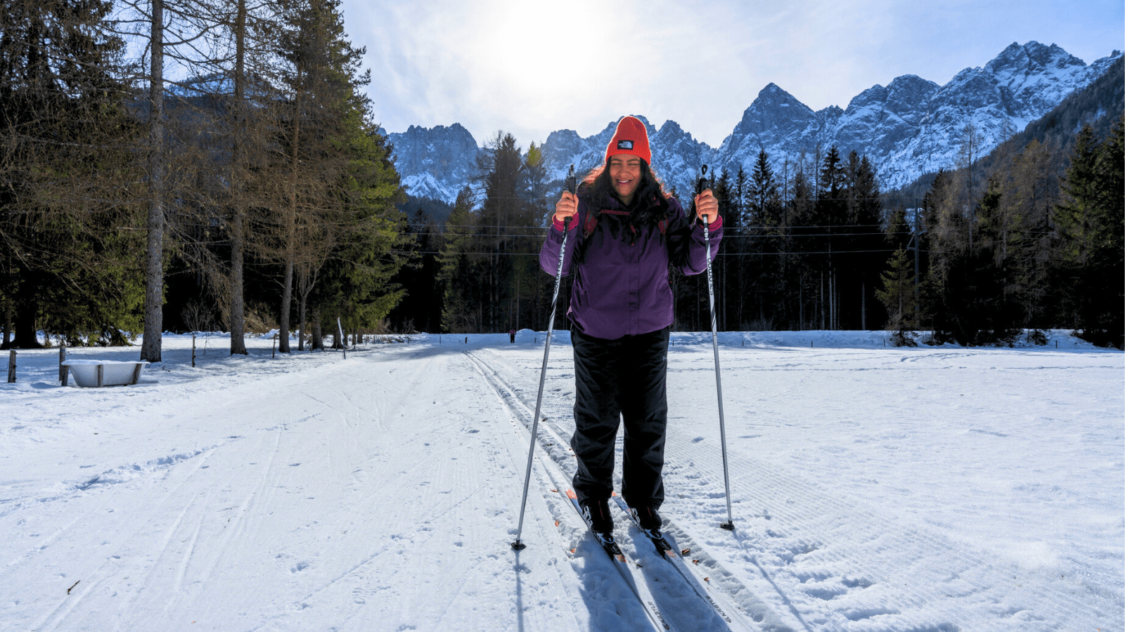 Woman smiling and having fun while Cross Country Skiing in Pokljuka near Bled, Slovenia