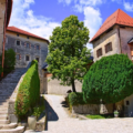 Bled Castle courtyard under blue sky