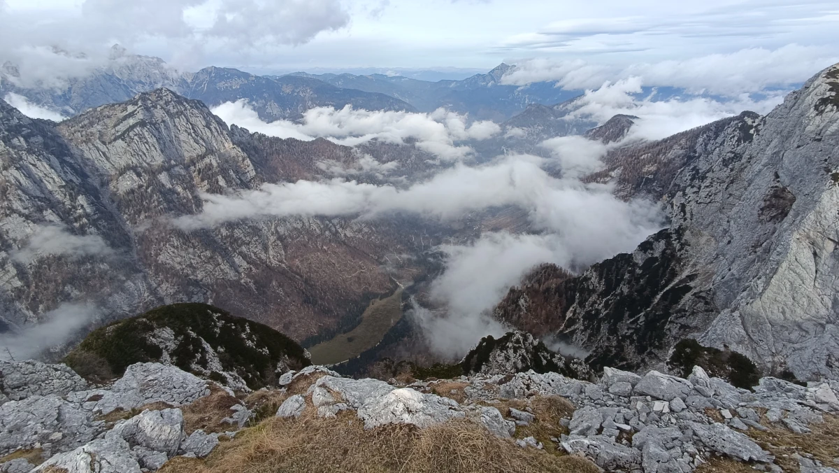 Aerial view of a mountain pass under the clouds